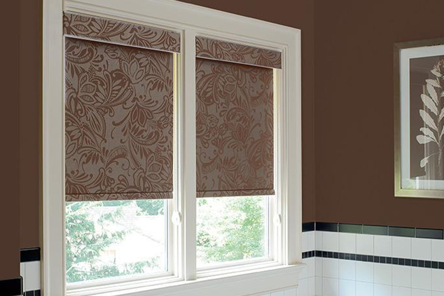 brown print of roller shade on a small window